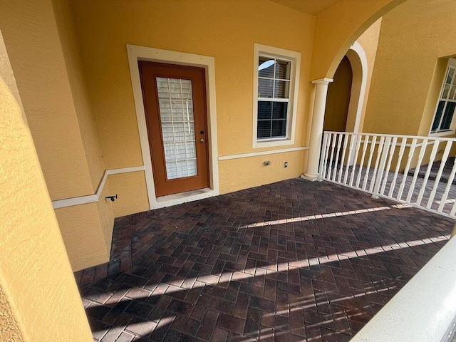108 W Pigeon Plum Dr W Unit 102, Jupiter, FL 33458 - entrance to property featuring stucco siding
