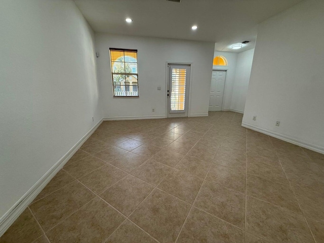 108 W Pigeon Plum Dr W Unit 102, Jupiter, FL 33458 - tiled spare room with recessed lighting and baseboards