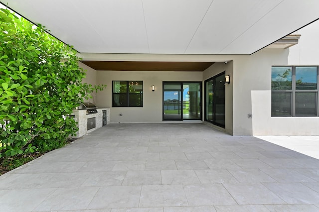17380 Rainstream Rd, Boca Raton, FL 33496 - view of patio / terrace featuring an outdoor kitchen