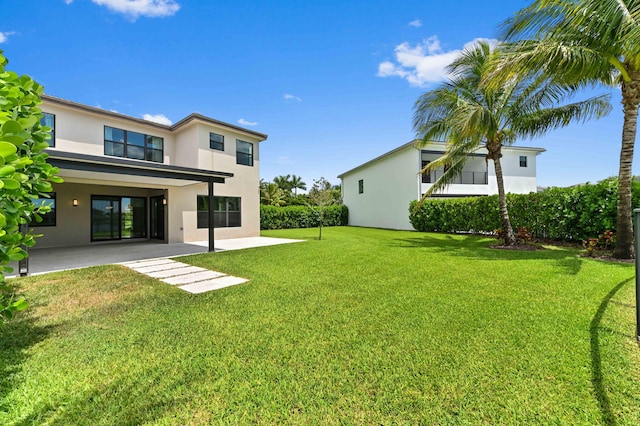 17380 Rainstream Rd, Boca Raton, FL 33496 - view of green lawn with a patio