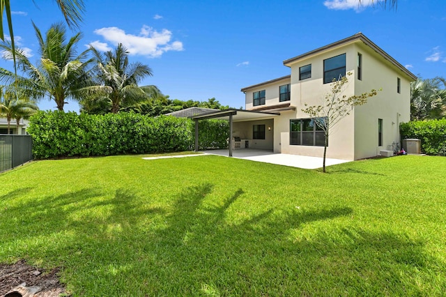 17380 Rainstream Rd, Boca Raton, FL 33496 - rear view of house featuring stucco siding and a patio