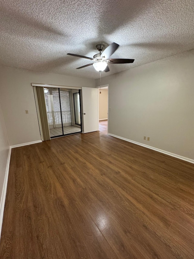 7626 Tahiti Ln Unit 204, Lake Worth, FL 33467 - unfurnished room featuring wood finished floors, ceiling fan, and a textured ceiling