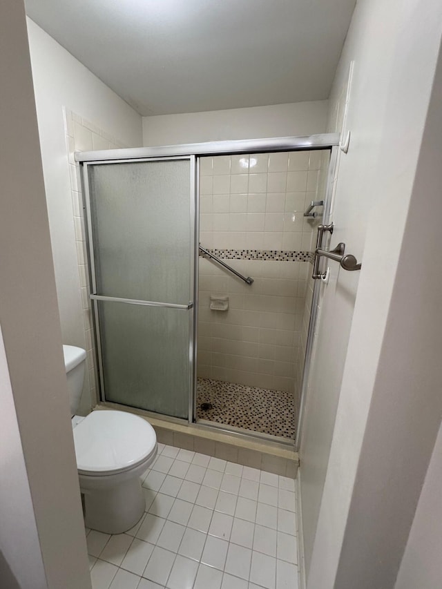 7626 Tahiti Ln Unit 204, Lake Worth, FL 33467 - bathroom with tile patterned floors and a stall shower