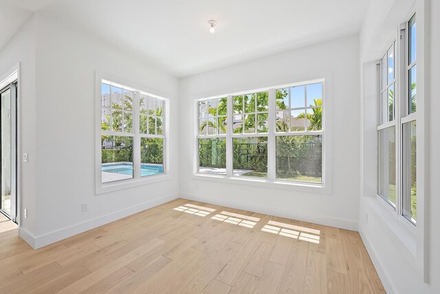 295 Austin Ln, West Palm Beach, FL 33401 - unfurnished sunroom with healthy amount of natural light