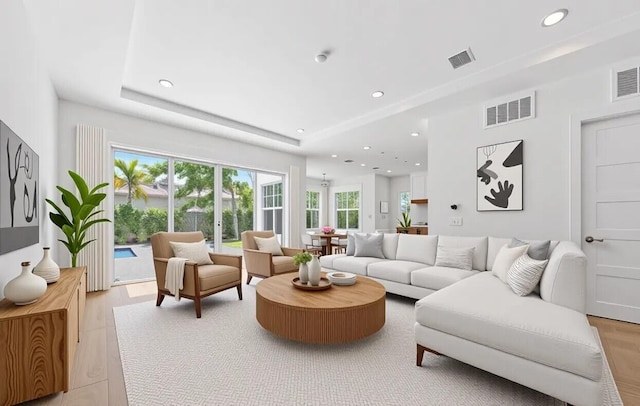 295 Austin Ln, West Palm Beach, FL 33401 - living room with light wood-style floors and recessed lighting