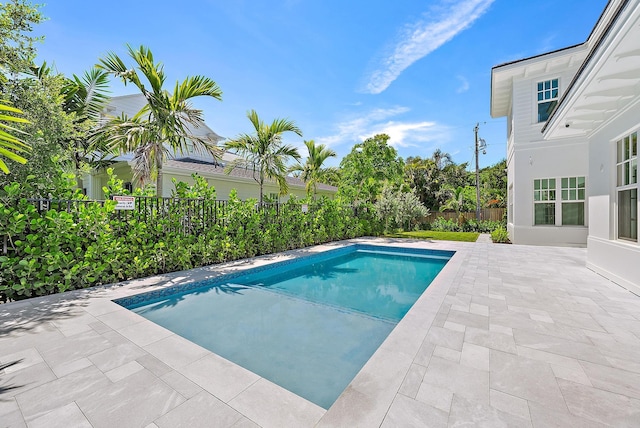295 Austin Ln, West Palm Beach, FL 33401 - view of pool with a patio area and a fenced backyard