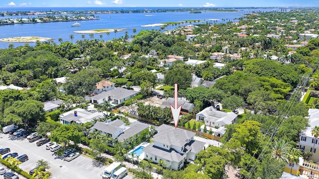 295 Austin Ln, West Palm Beach, FL 33401 - aerial perspective of suburban area with a nearby body of water