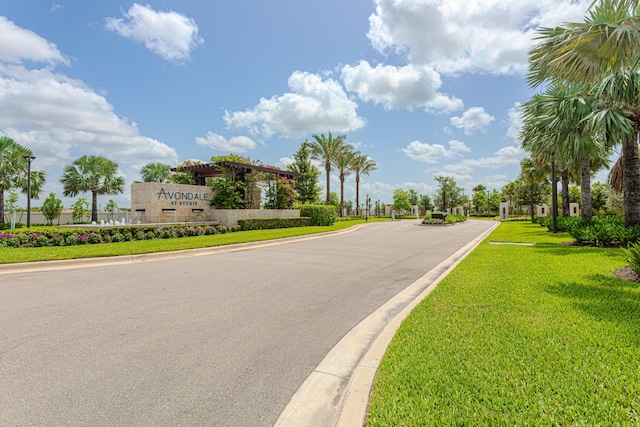 10815 Stellar Cir, Palm Beach Gardens, FL 33412 - view of asphalt street featuring curbs