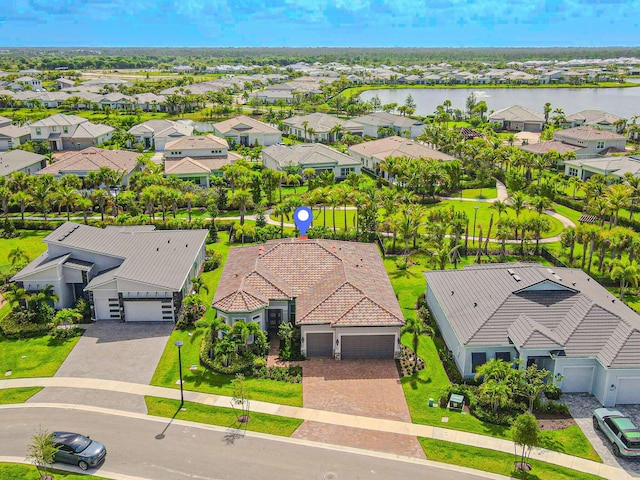 10815 Stellar Cir, Palm Beach Gardens, FL 33412 - aerial perspective of suburban area with a nearby body of water