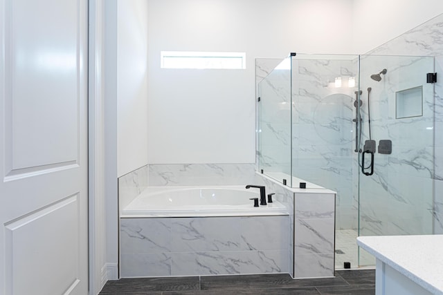 10815 Stellar Cir, Palm Beach Gardens, FL 33412 - bathroom with a garden tub, a marble finish shower, and vanity