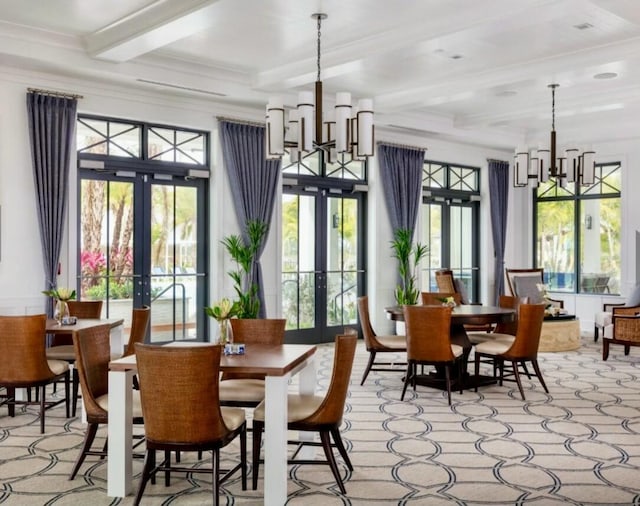10815 Stellar Cir, Palm Beach Gardens, FL 33412 - dining room featuring french doors, a chandelier, beam ceiling, plenty of natural light, and coffered ceiling