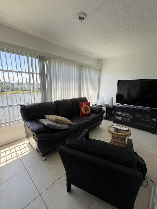4022 Wolverton B, Boca Raton, FL 33434 - living room with tile patterned floors and a textured ceiling