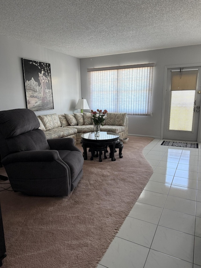 4022 Wolverton B, Boca Raton, FL 33434 - carpeted living area with a textured ceiling and tile patterned flooring