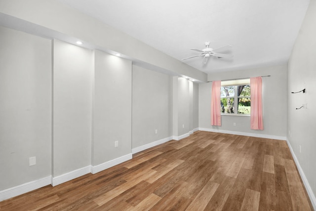 3611 NW Willow Creek Dr, Jensen Beach, FL 34957 - spare room with ceiling fan and wood finished floors