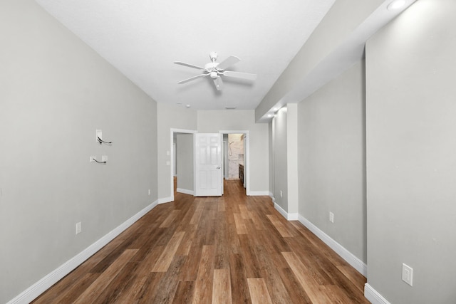 3611 NW Willow Creek Dr, Jensen Beach, FL 34957 - unfurnished living room with wood finished floors and a ceiling fan