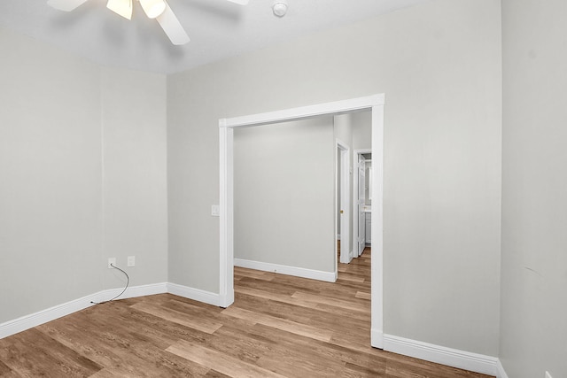 3611 NW Willow Creek Dr, Jensen Beach, FL 34957 - unfurnished room with a ceiling fan, wood finished floors, and a smoke detector