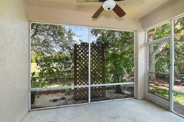 3611 NW Willow Creek Dr, Jensen Beach, FL 34957 - unfurnished sunroom with a ceiling fan and plenty of natural light
