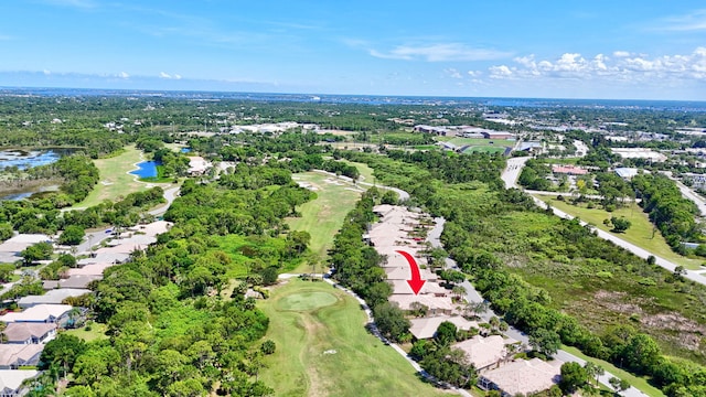 3611 NW Willow Creek Dr, Jensen Beach, FL 34957 - aerial view of property's location with a large body of water, a golf club, and nearby suburban area