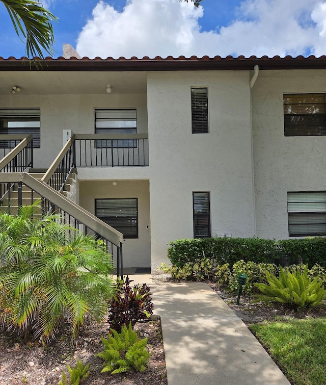 21404 Cypress Hammock Dr Unit 45E, Boca Raton, FL 33428 - view of property featuring stairway