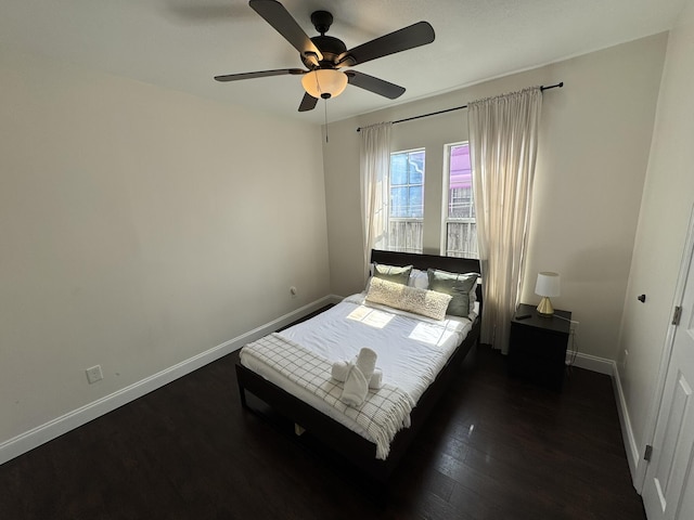 639 38th St, West Palm Beach, FL 33407 - bedroom featuring dark wood-type flooring and ceiling fan