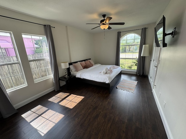 639 38th St, West Palm Beach, FL 33407 - bedroom with wood finished floors and ceiling fan