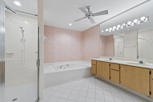 348 River Edge Rd, Jupiter, FL 33477 - full bathroom with wallpapered walls, a stall shower, a garden tub, double vanity, and ceiling fan
