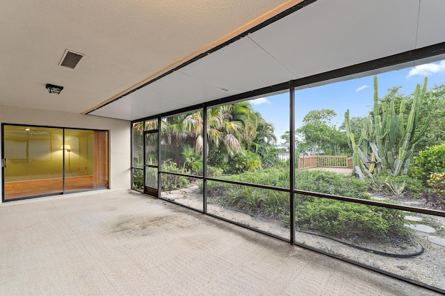 348 River Edge Rd, Jupiter, FL 33477 - unfurnished sunroom featuring expansive windows