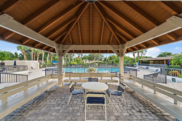 348 River Edge Rd, Jupiter, FL 33477 - view of patio / terrace featuring a gazebo and a community pool