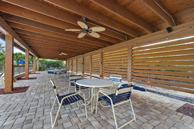 348 River Edge Rd, Jupiter, FL 33477 - view of patio featuring outdoor dining area and ceiling fan