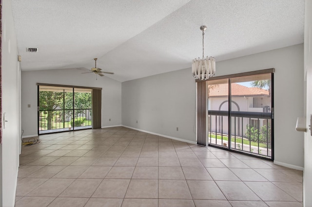 400 Club Cir Unit 201, Boca Raton, FL 33487 - spare room with a ceiling fan, vaulted ceiling, light tile patterned floors, a chandelier, and a textured ceiling