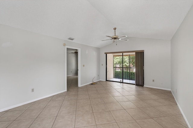 400 Club Cir Unit 201, Boca Raton, FL 33487 - empty room featuring a ceiling fan, vaulted ceiling, and light tile patterned floors