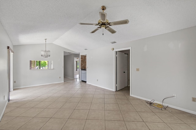 400 Club Cir Unit 201, Boca Raton, FL 33487 - empty room featuring ceiling fan, lofted ceiling, a textured ceiling, a chandelier, and light tile patterned flooring