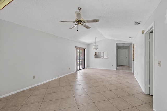 400 Club Cir Unit 201, Boca Raton, FL 33487 - empty room with vaulted ceiling, a ceiling fan, light tile patterned floors, a textured ceiling, and a chandelier