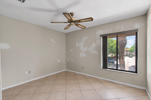 400 Club Cir Unit 201, Boca Raton, FL 33487 - unfurnished room featuring ceiling fan, a textured ceiling, and tile patterned flooring
