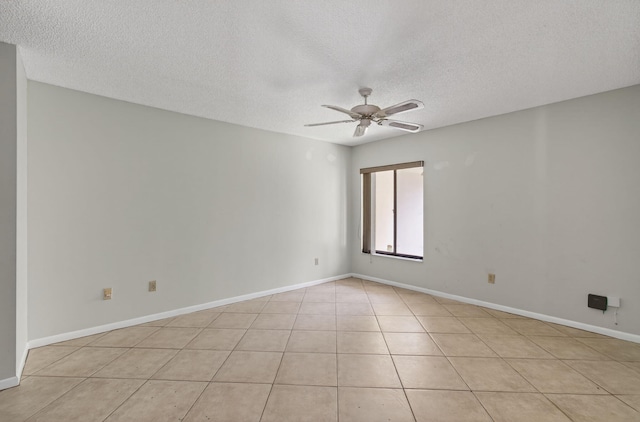 400 Club Cir Unit 201, Boca Raton, FL 33487 - unfurnished room with a textured ceiling, a ceiling fan, and light tile patterned floors