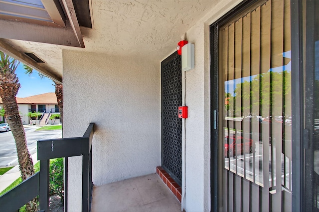 400 Club Cir Unit 201, Boca Raton, FL 33487 - view of exterior entry featuring stucco siding