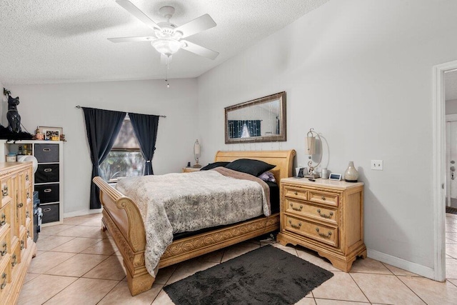 2997 SW Collings Dr, Port Saint Lucie, FL 34953 - bedroom featuring lofted ceiling, light tile patterned flooring, a textured ceiling, and a ceiling fan
