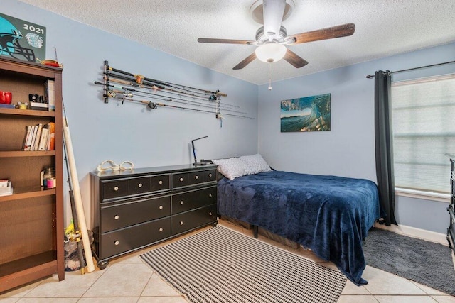 2997 SW Collings Dr, Port Saint Lucie, FL 34953 - bedroom featuring a textured ceiling, light tile patterned flooring, multiple windows, and a ceiling fan