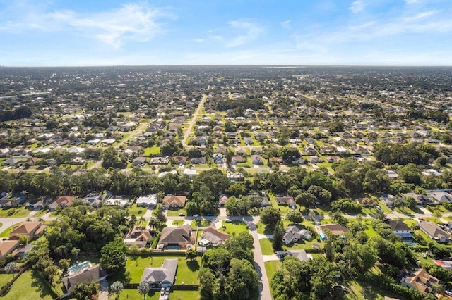 2997 SW Collings Dr, Port Saint Lucie, FL 34953 - aerial view of property and surrounding area with nearby suburban area