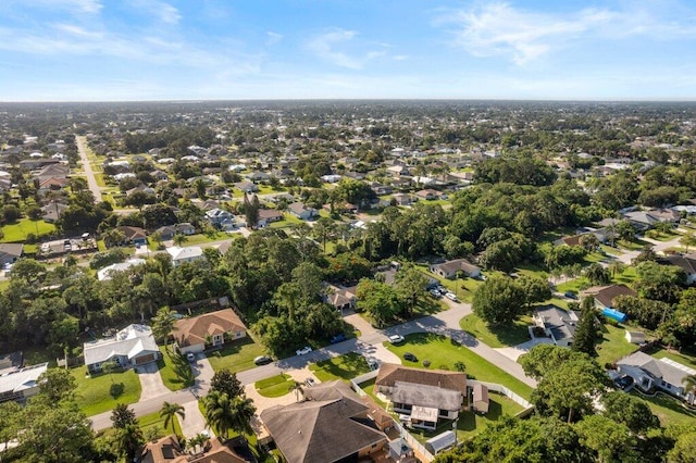 2997 SW Collings Dr, Port Saint Lucie, FL 34953 - aerial view of property and surrounding area with nearby suburban area