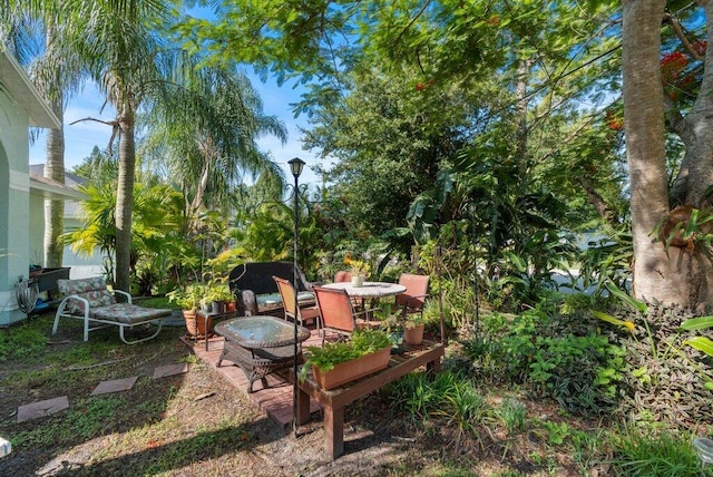 2997 SW Collings Dr, Port Saint Lucie, FL 34953 - view of yard featuring a patio area