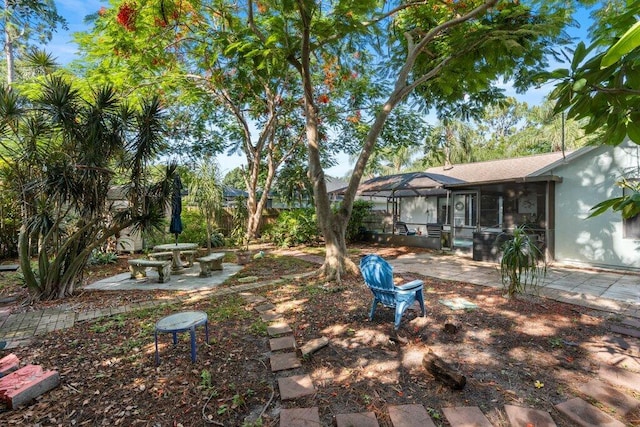 2997 SW Collings Dr, Port Saint Lucie, FL 34953 - view of yard featuring a patio area