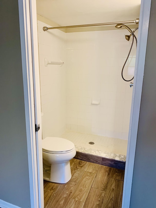 1100 Scotia Dr Unit 102, Hypoluxo, FL 33462 - bathroom featuring a shower stall and wood finished floors