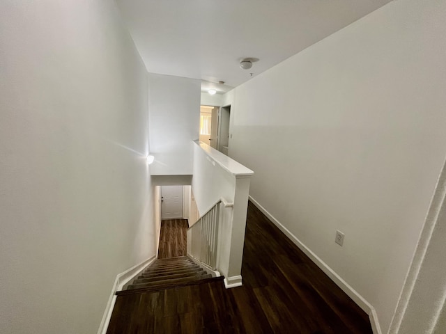 1100 Scotia Dr Unit 102, Hypoluxo, FL 33462 - stairway featuring wood finished floors and baseboards
