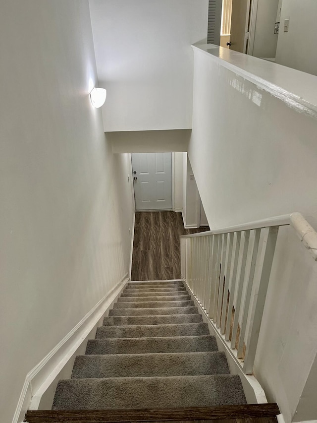 1100 Scotia Dr Unit 102, Hypoluxo, FL 33462 - stairs with wood finished floors