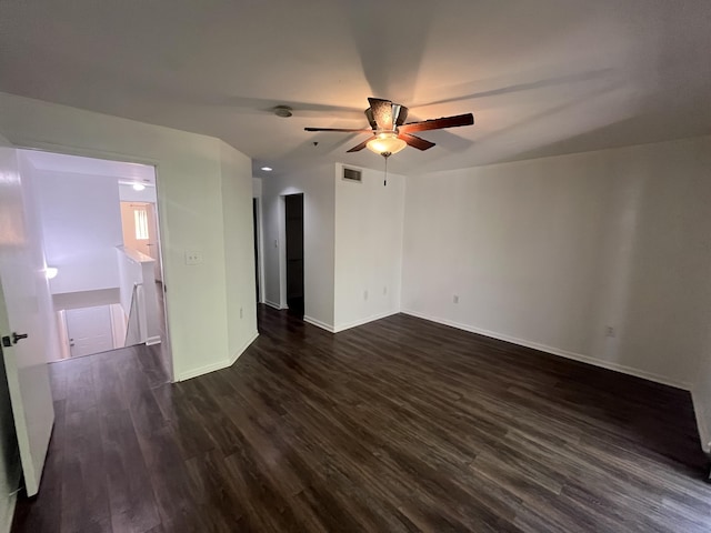 1100 Scotia Dr Unit 102, Hypoluxo, FL 33462 - spare room featuring a ceiling fan and dark wood finished floors