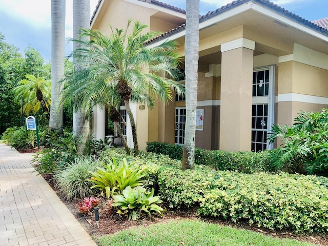 1100 Scotia Dr Unit 102, Hypoluxo, FL 33462 - entrance to property featuring stucco siding