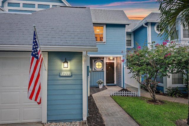 1219 Ocean Dunes Cir, Jupiter, FL 33477 - multi unit property with an attached garage and a shingled roof