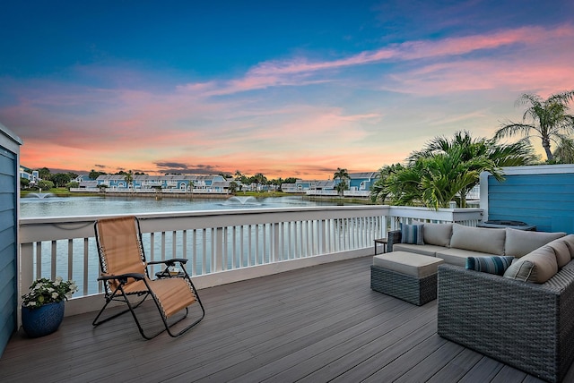 1219 Ocean Dunes Cir, Jupiter, FL 33477 - deck at dusk with a water view and an outdoor living space