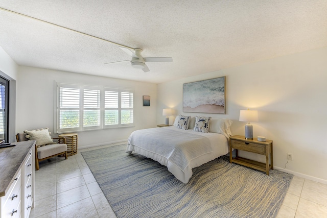 2571 NE Ocean Blvd Unit 104, Stuart, FL 34996 - bedroom featuring light tile patterned floors and ceiling fan